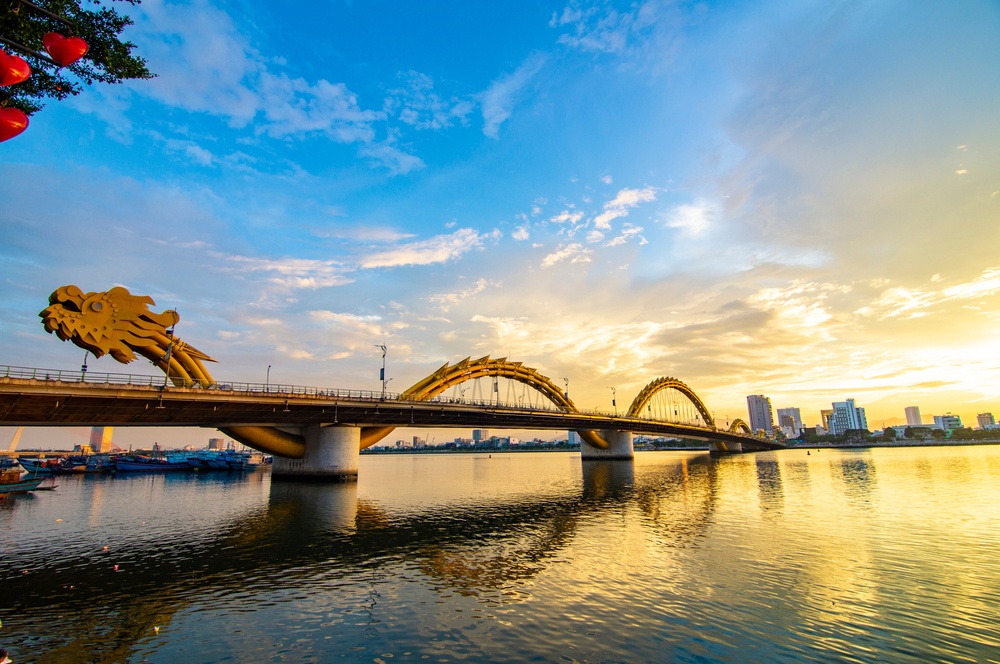 bridge from city at dusk