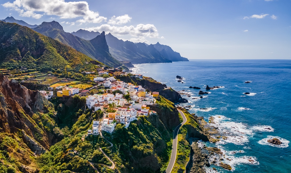 aerial view of town overlooking cliffside road