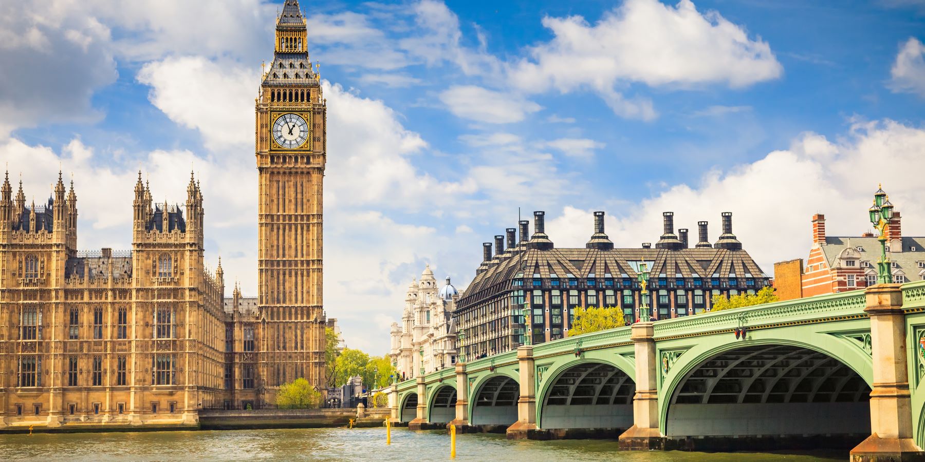 view from river of london bridge and big ben