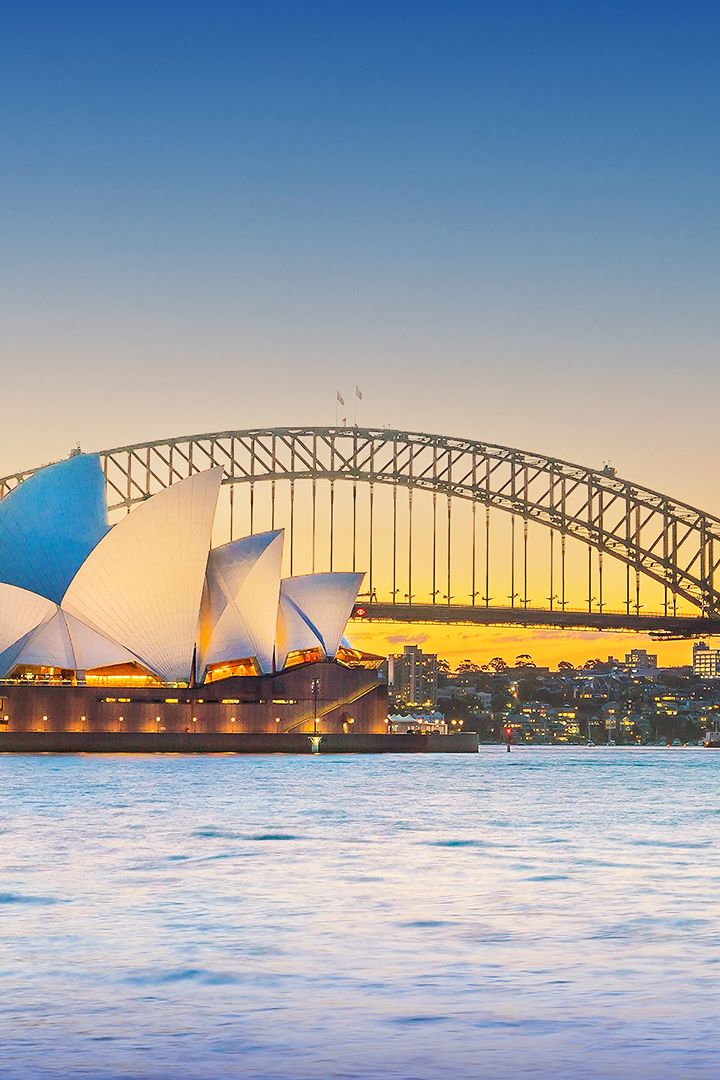 view of opera house in sydney at dusk