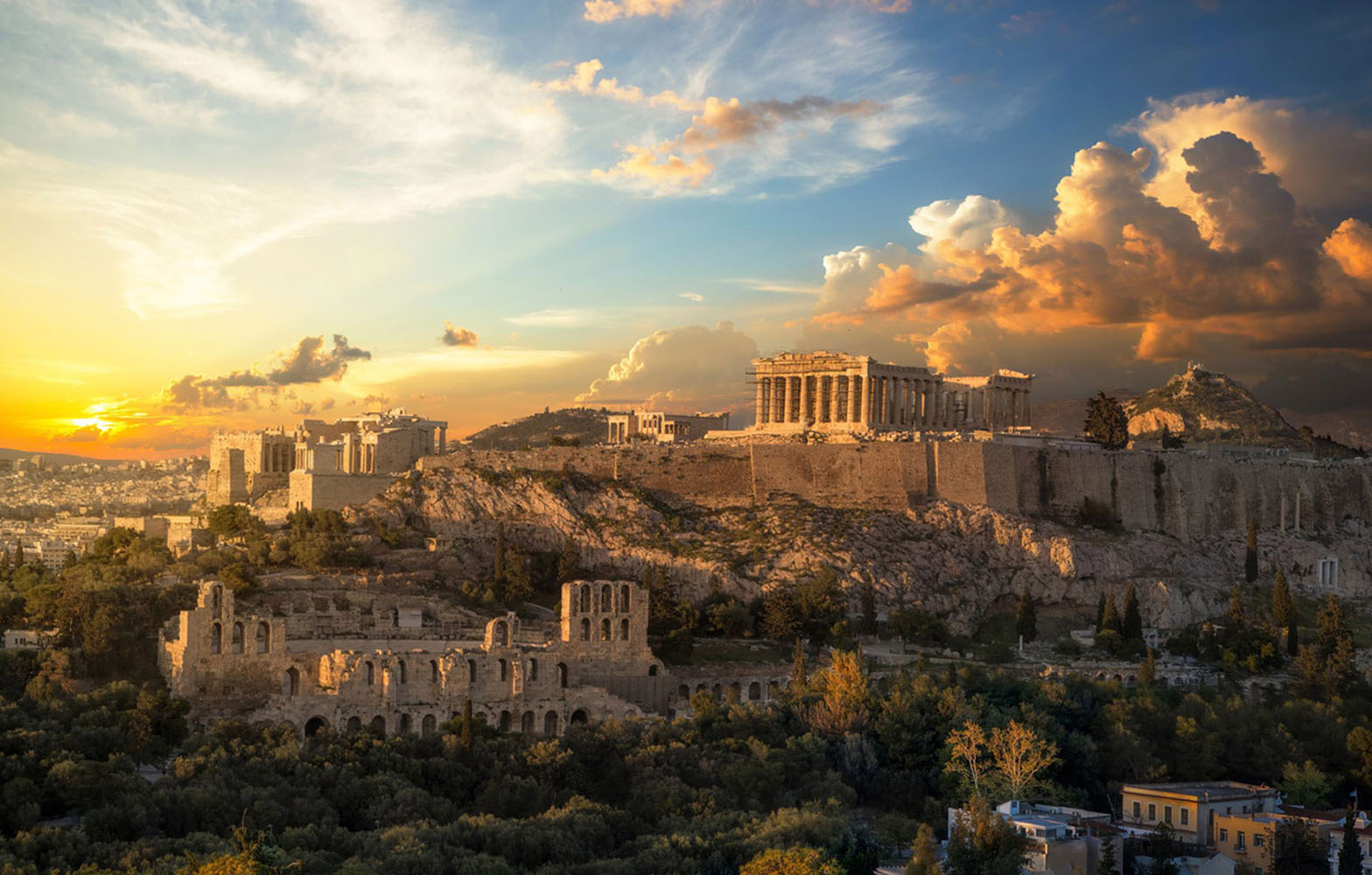 Acropolis of Athens at golden hour with a beautiful dramatic sky 