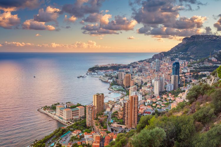 Cityscape image of Monte Carlo, Monaco during summer sunset.